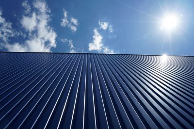 Standing seam metal roofing installed on a commercial roof.